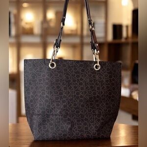 Calvin Klein Monogram Dark Brown Tote with Gold Hardware/Suede Lining